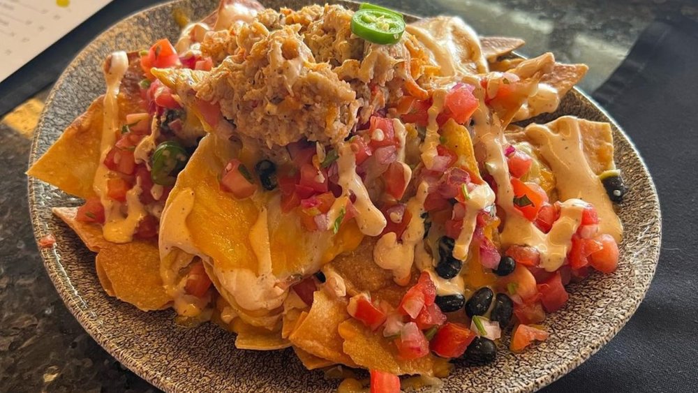 Lobster Nachos are so delicious, one plate isn’t enough! Credits to @pixellexie