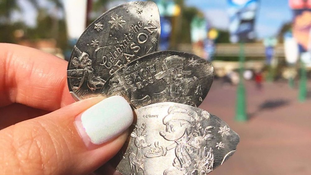 Collect pressed coins as you go around the park. Photo credits to enchantedpenny on Instagram