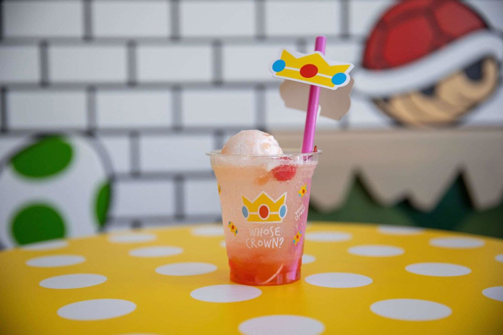A Mario-themed drink on a table