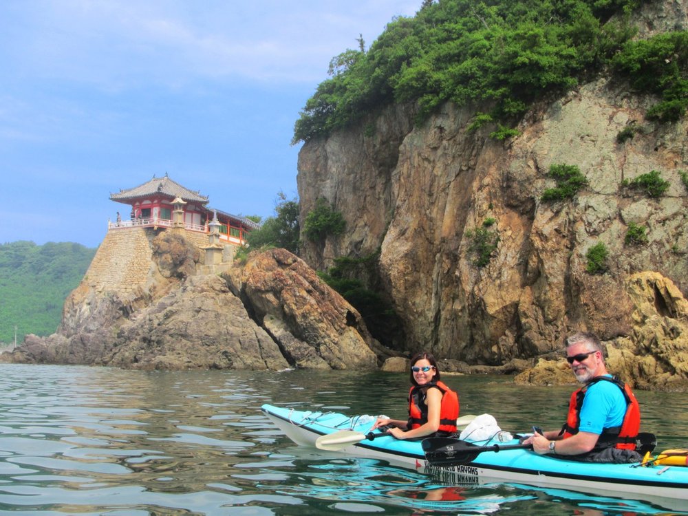 A man and a woman on a kayak