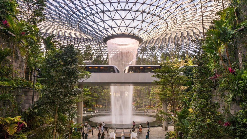 Check out the iconic Rain Vortex at Jewel Changi Airport. Credits: Darren Nunis on Unsplash