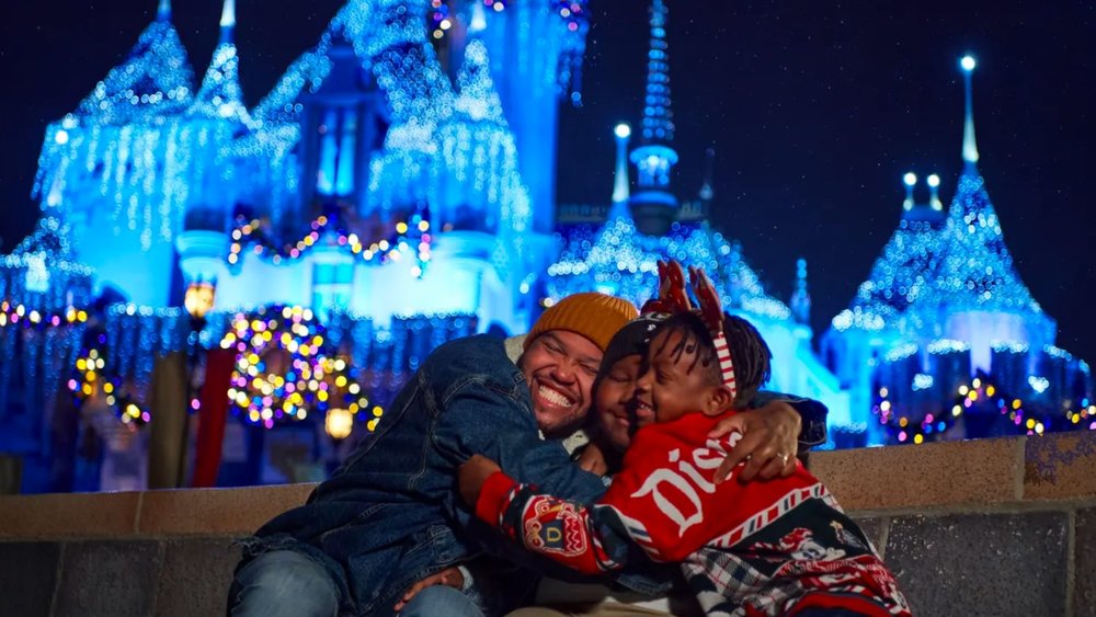 a family enjoying the holidays at Disneyland Resort California