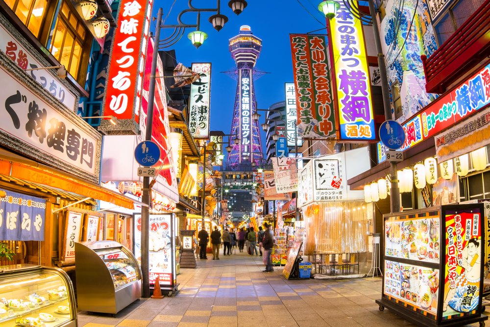 Well lit stalls and stores on the streets of Osaka