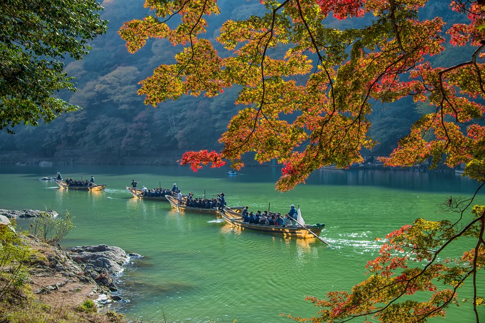 People on boats on a river
