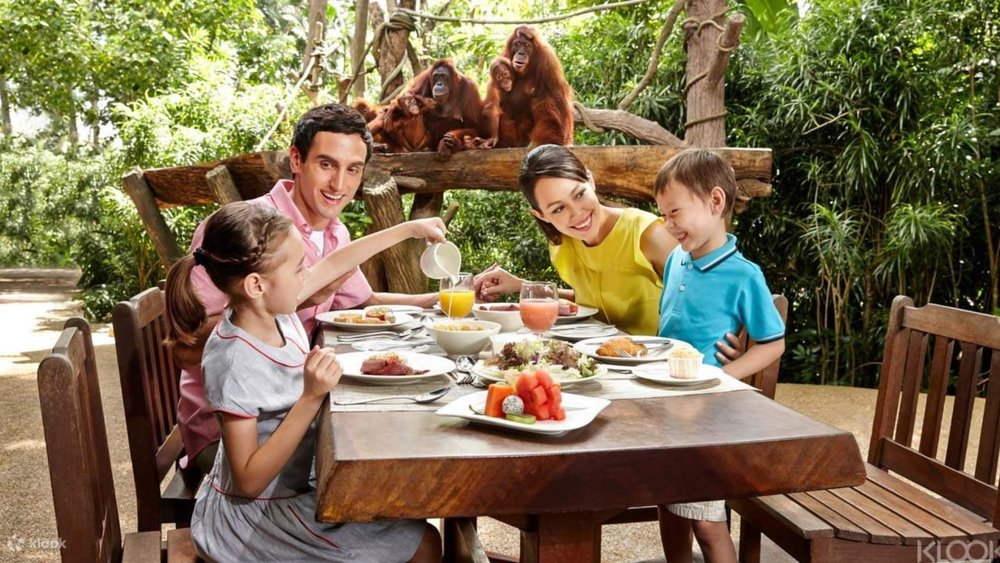 a family eating at the Singapore Zoo Breakfast