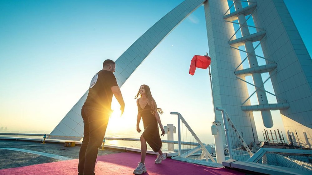 a couple enjoying the Burj Al Arab helipad