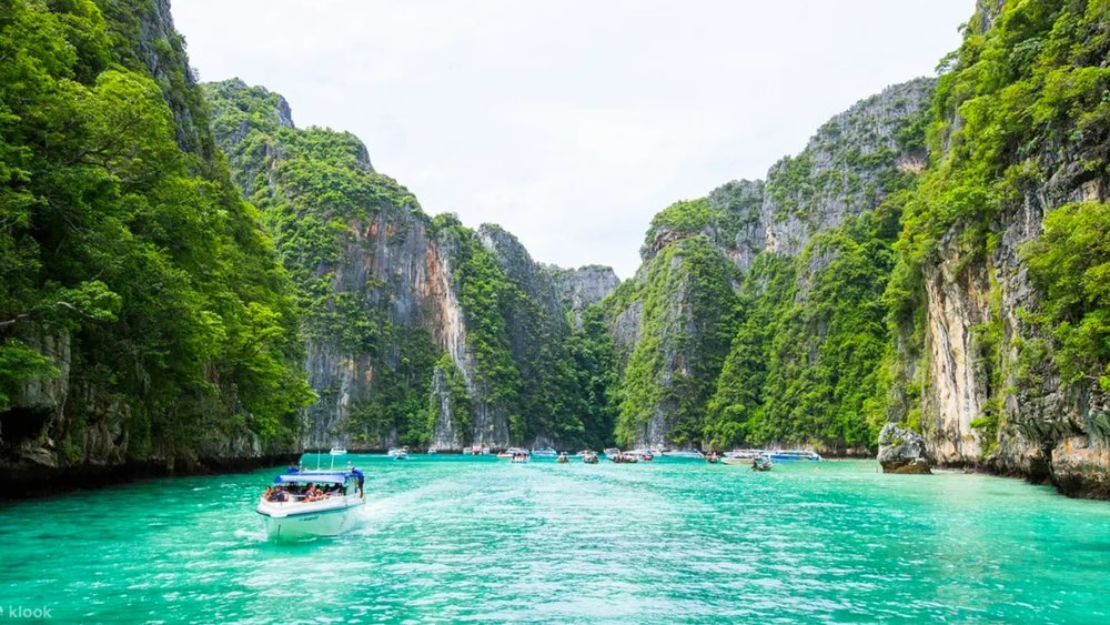 a boat touring Phi Phi Island