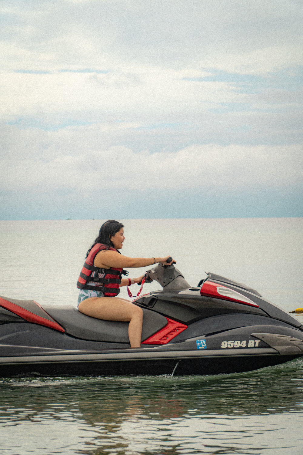 woman riding on jet ski