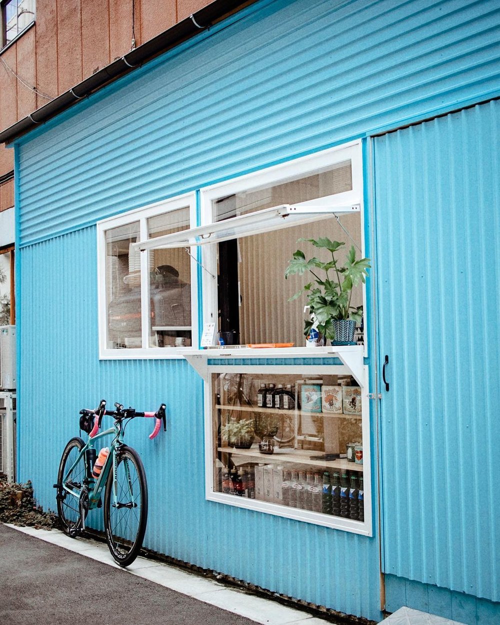 bicycle in front of coffee shop