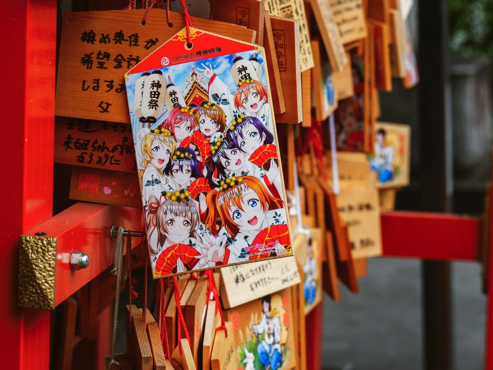 anime themed omamori and ema