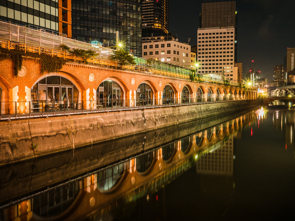 old train station turned into a beautiful shopping area by the river