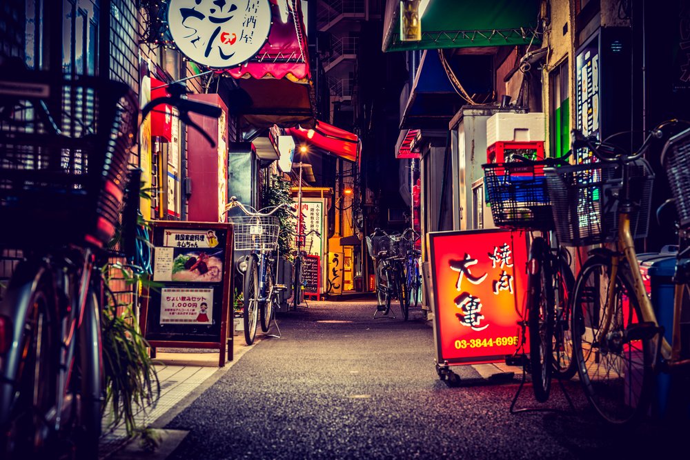 asakusa streets at night with little shops and signages