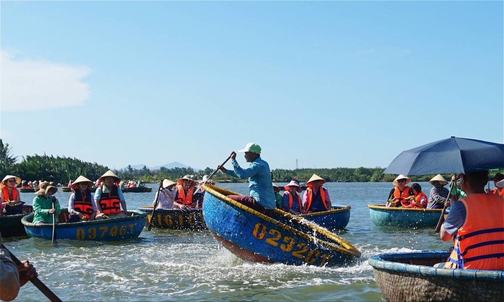 people on circular basket boats 