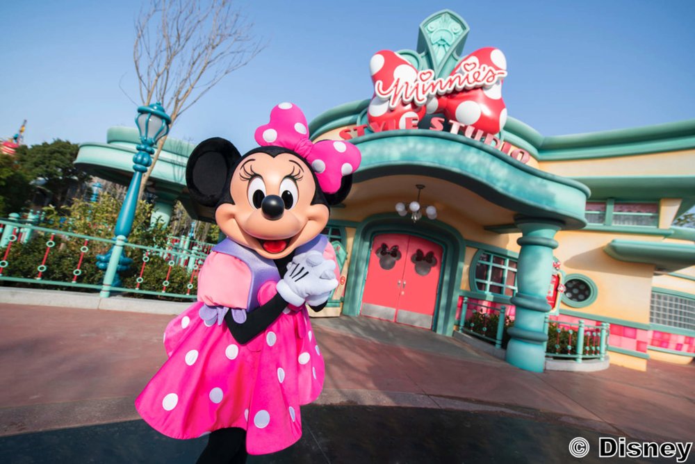 minnie mouse in front of minnie's style studio