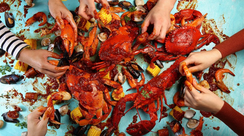 a variety of seasoned seafood all ready to eat