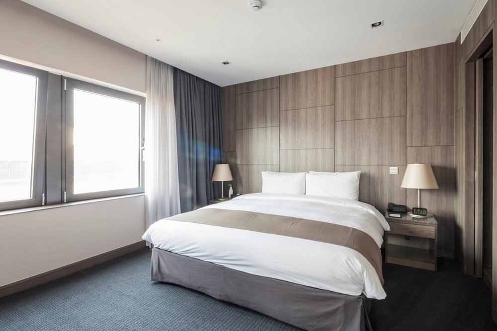 sleeping room with bed, pillow, blanket at the hotel in seoul