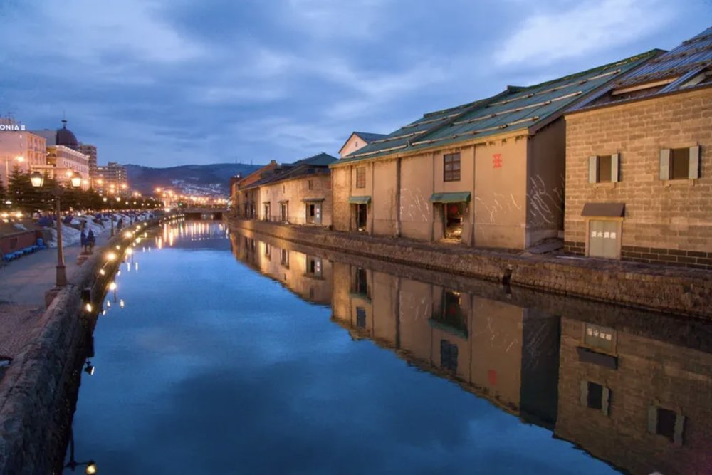 Houses beside a river