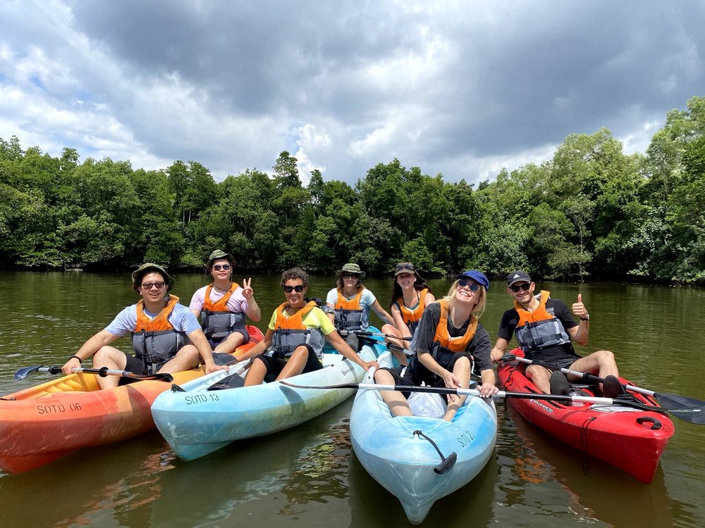 Group of people on kayaks