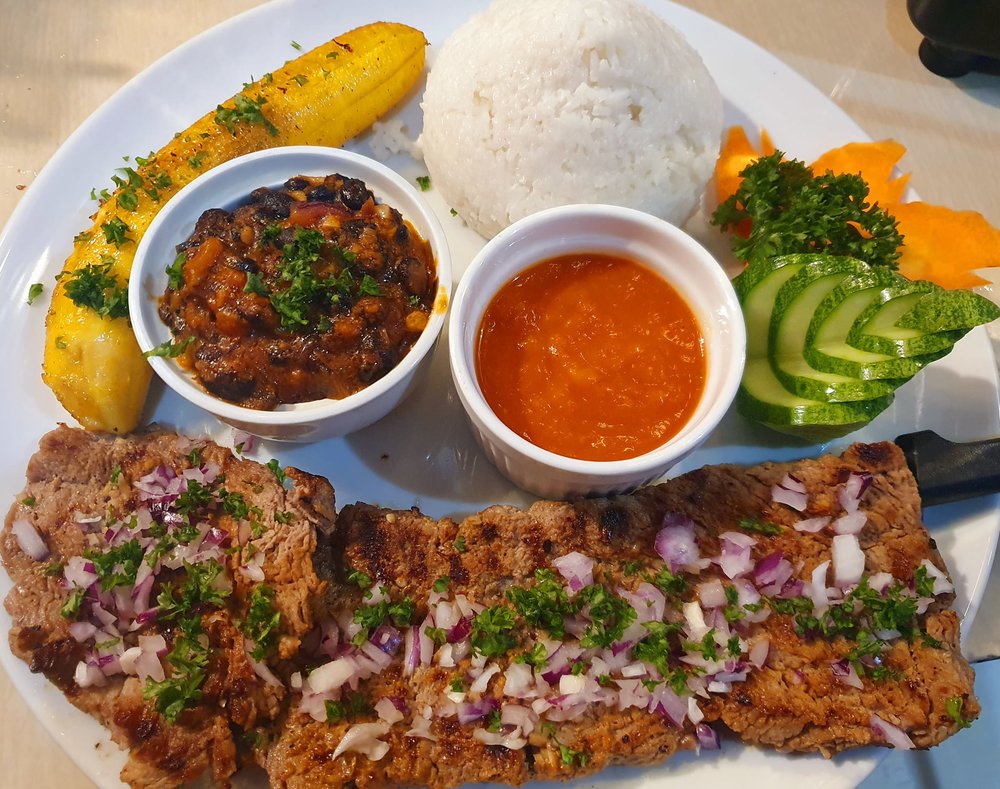 Spanish dish with vegetables as side dish