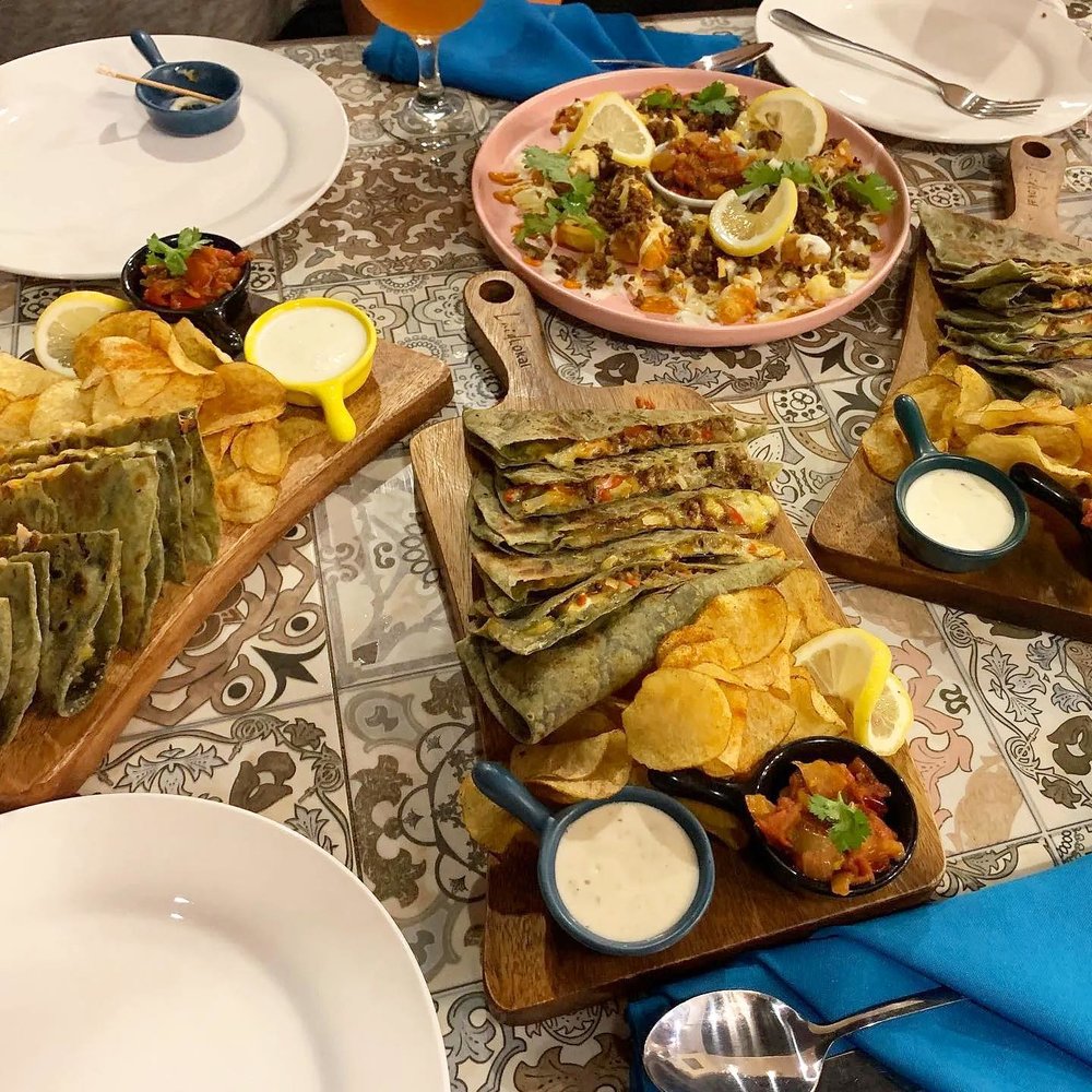 Quesadilla with potato in the side