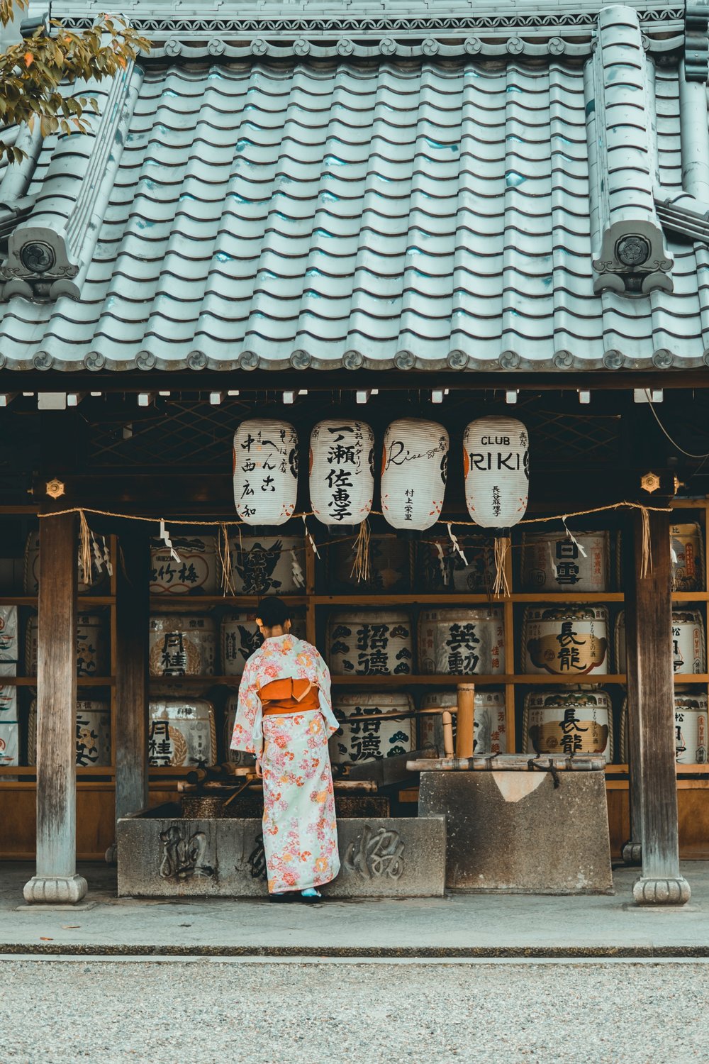 girl in kimono by a temple