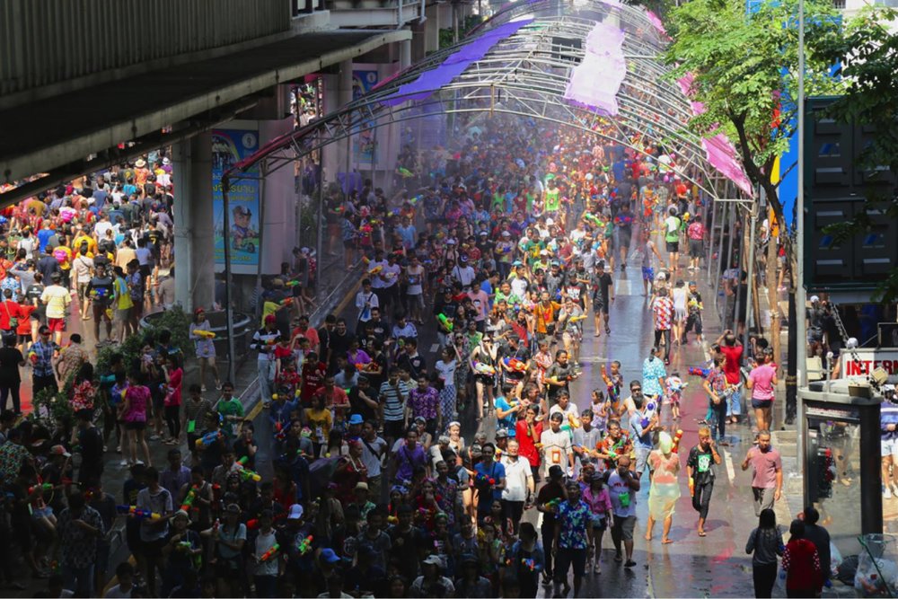 People water fight in the street