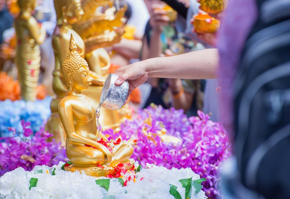 People offering prayer in the temple
