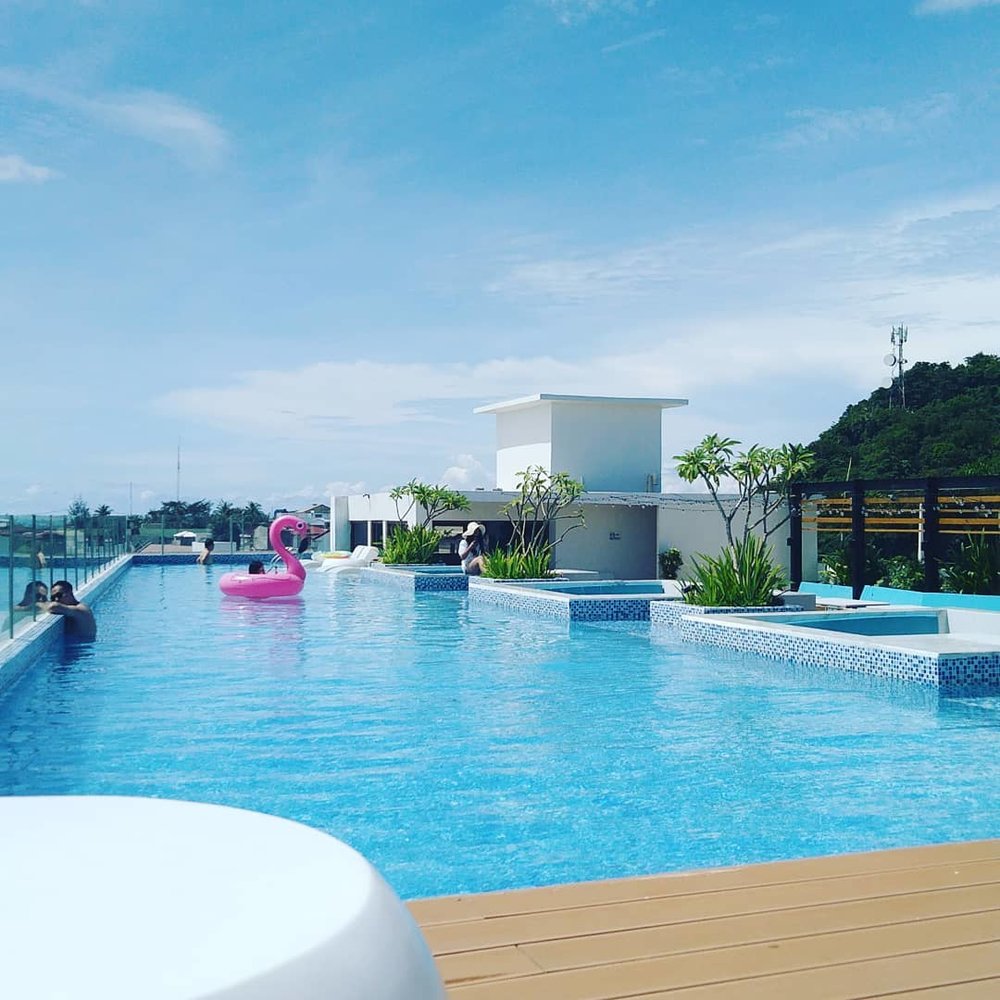 Swimming pool with a pink floaties