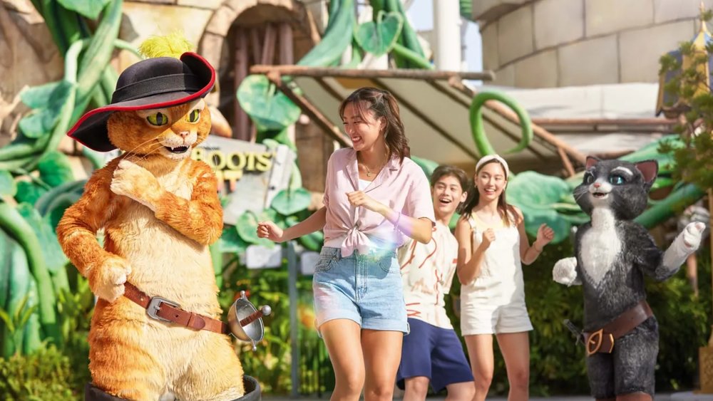 tourists having fun with Puss in Boots in Singapore