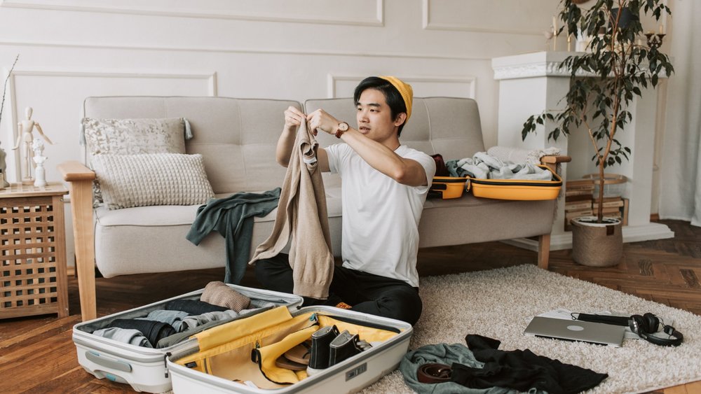 a man packing for his next flight