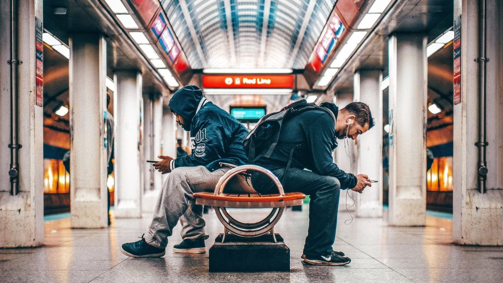 people listening to music inside a station