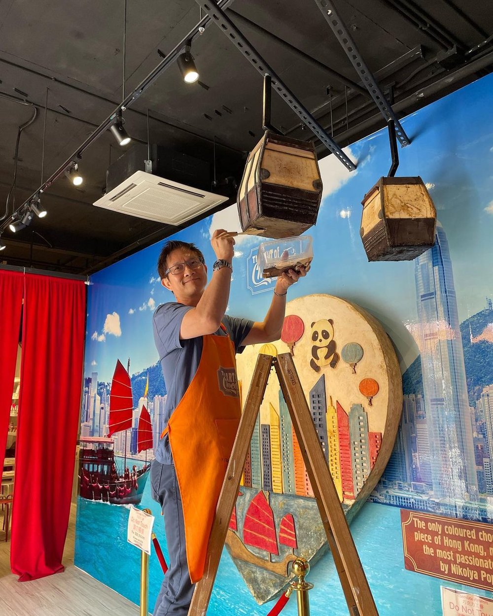 Person installing a lamp display