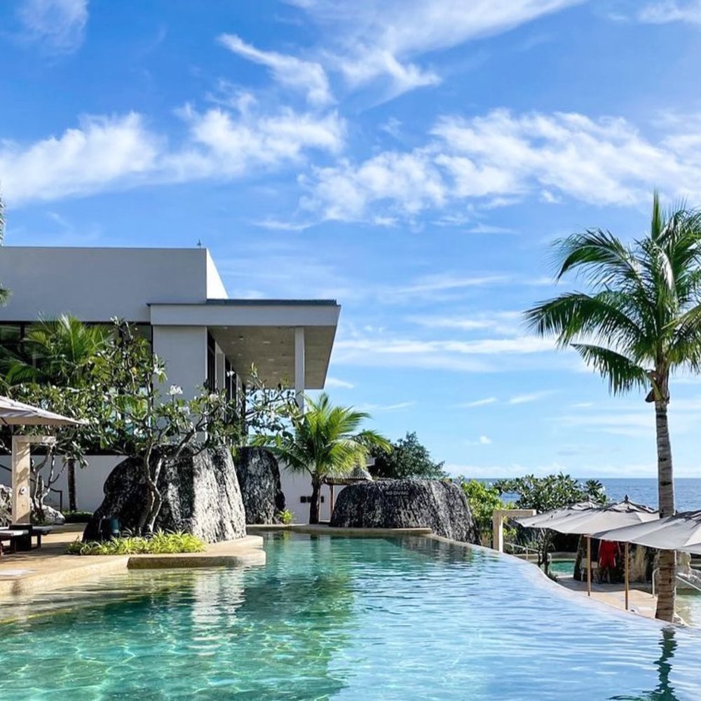A pool with the view of the sea