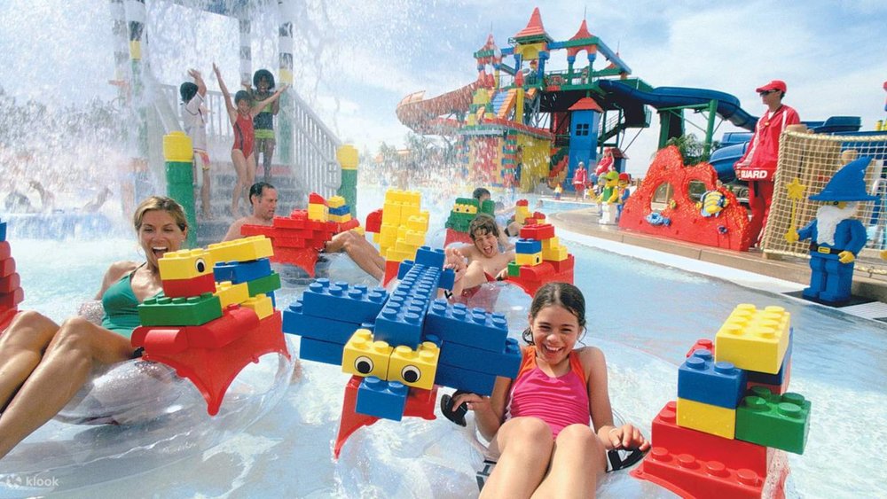 a family enjoying LEGOLAND Water Park Dubai