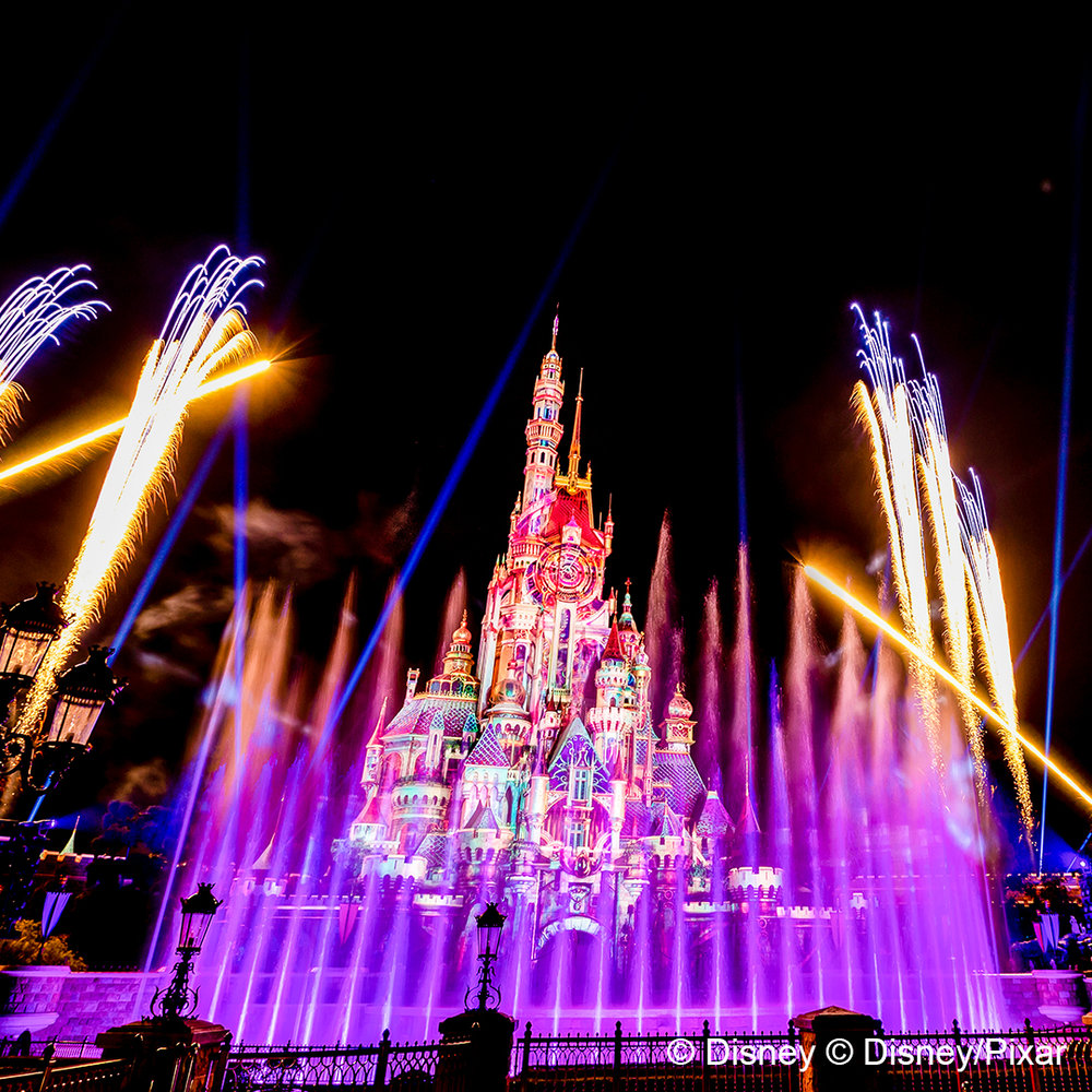 hong kong disneyland castle at night