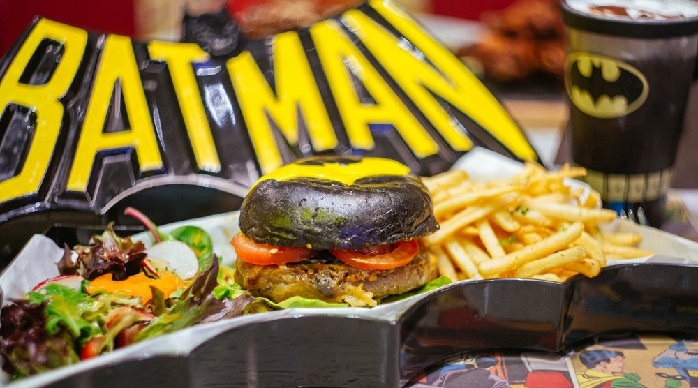 Batman-themed burger with a side of fries