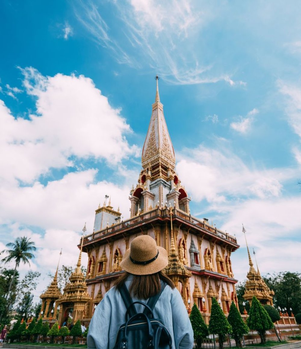 A tourist looking at the temple