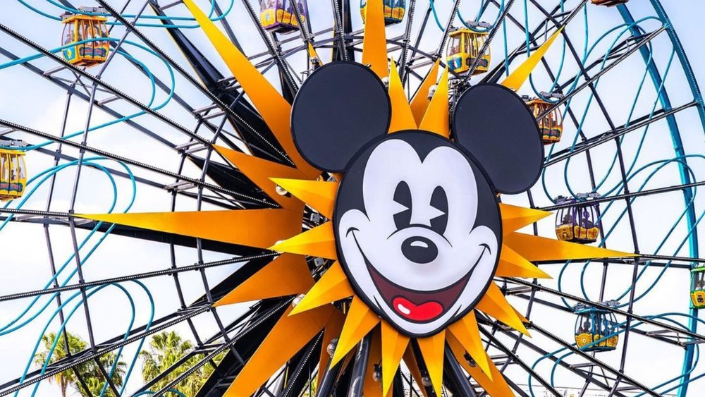 The Ferris wheel, with its towering structure and rotating gondolas, provides breathtaking views and a thrilling experience for riders of all ages. Photo credit to @disneylandinfocus on Instagram.