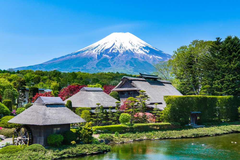 Huts in front of a mountain view