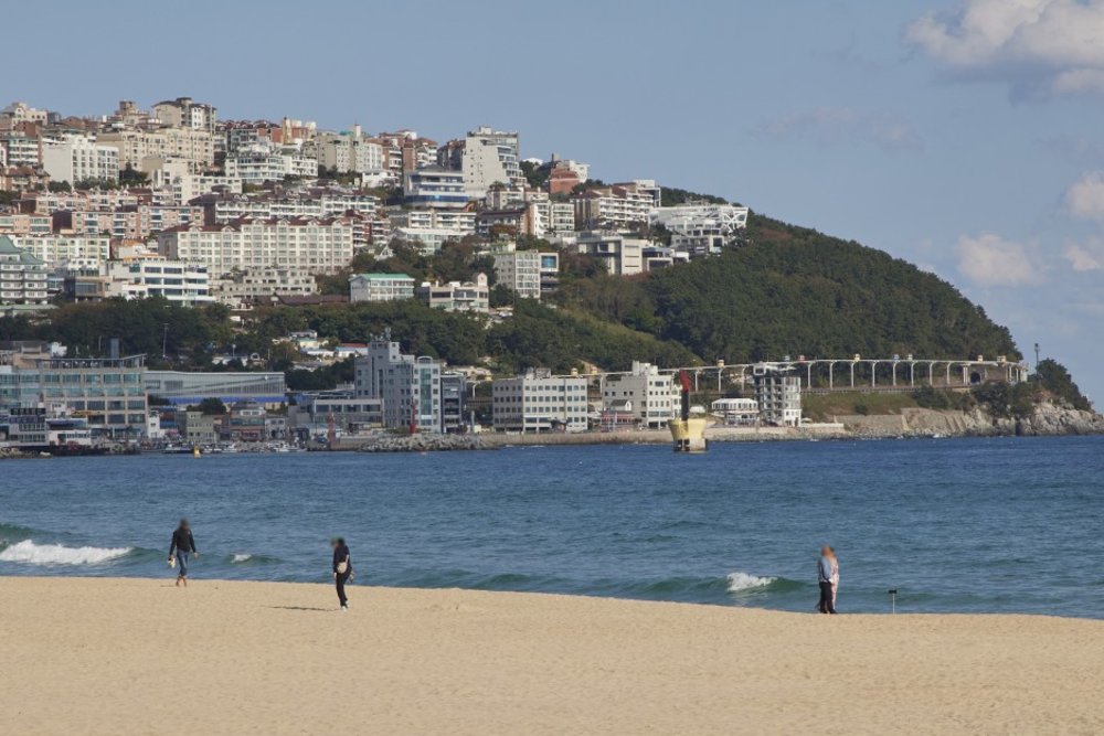 Haeundae Beach with a view of Busan in the back