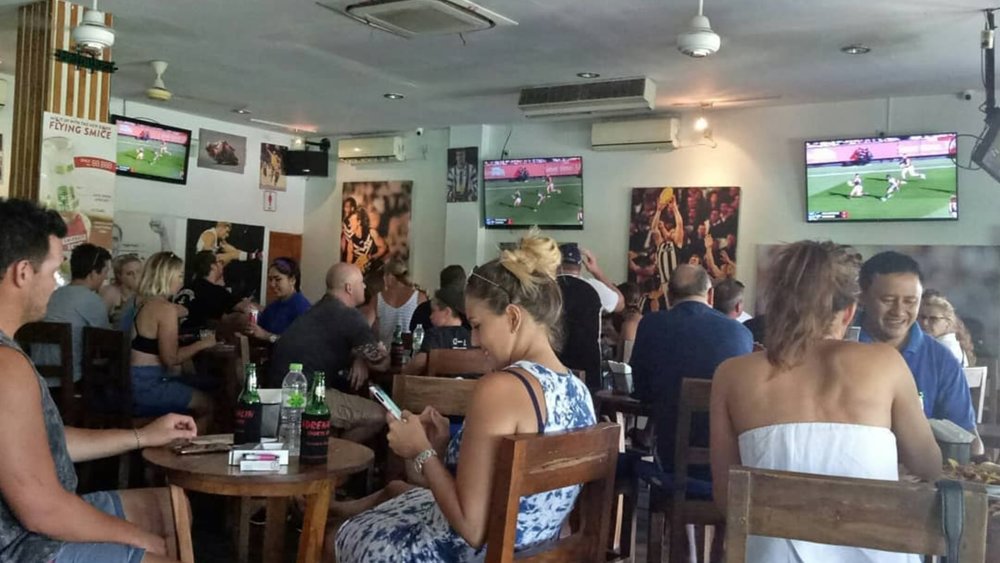 Munch on your favourite comfort food as you cheer for your team!  Credits: @adrenalin_sportsbar on Instagram