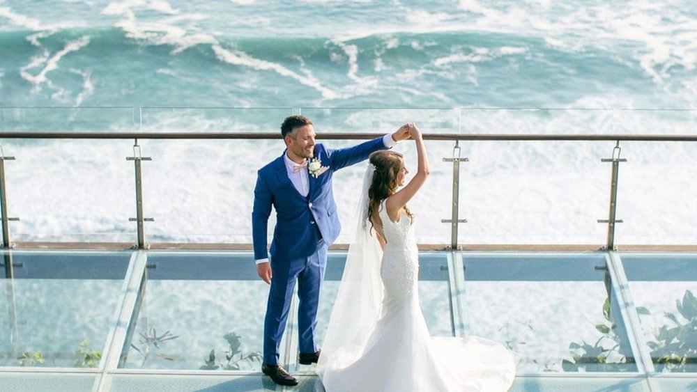 Have your first dance as a married couple by the ocean. Credits to @evermotionphoto on Instagram.
