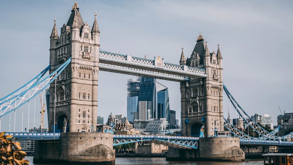 The Tower Bridge is known for its Neo-Gothic architecture. Credits to Charles Postiaux on Unsplash