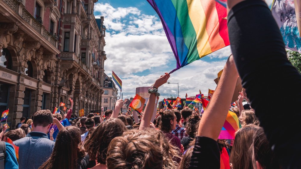 Join a parade this Pride Month! Credits to Margaux Bellott on Unsplash