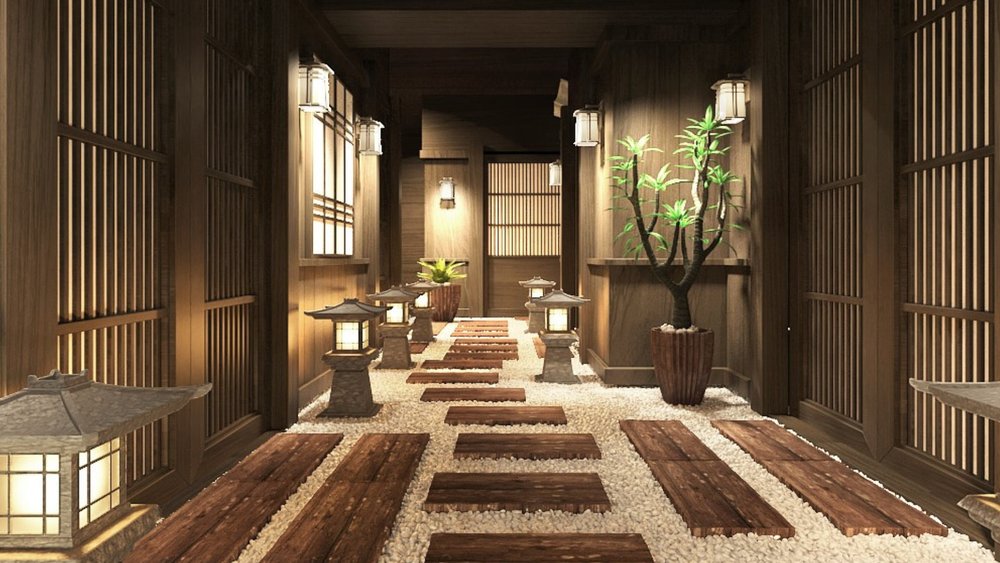 a spa lobby with white stones and wooden plans as flooring and beautiful lanterns that light the area