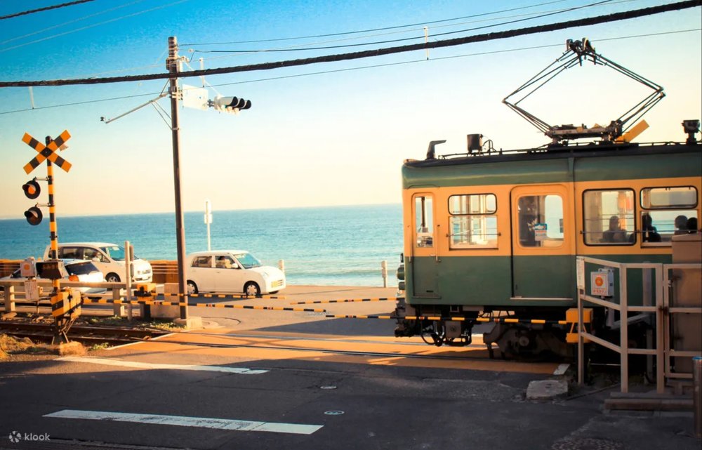 train crossing with an ocean view