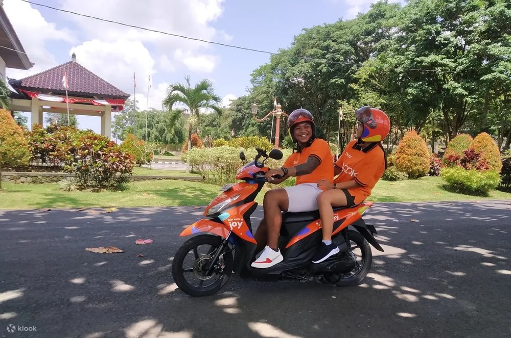 Two person in scooter