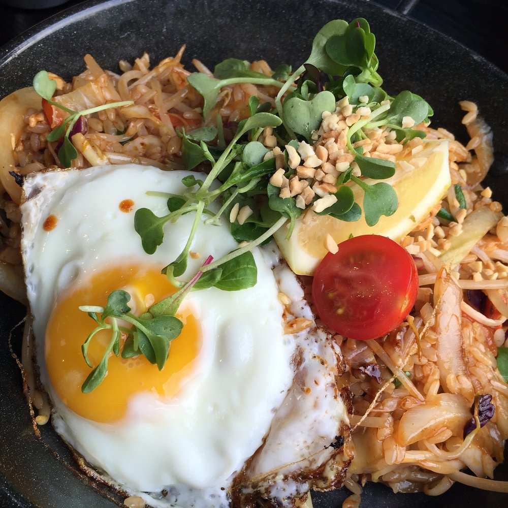 Egg with tomato and leaf
