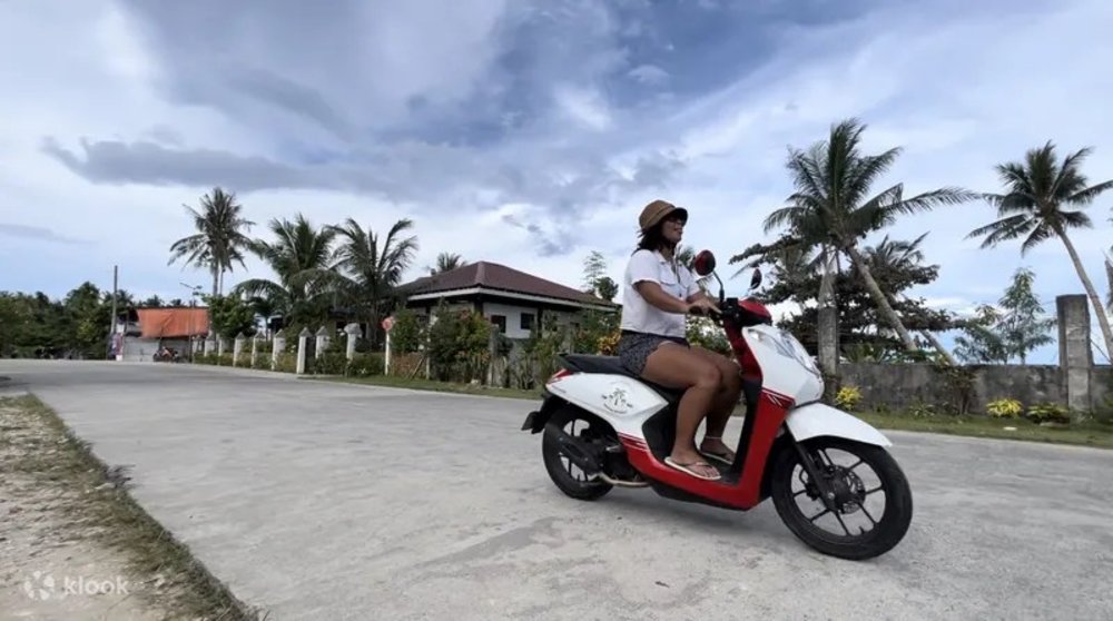 Girl riding a motorbike