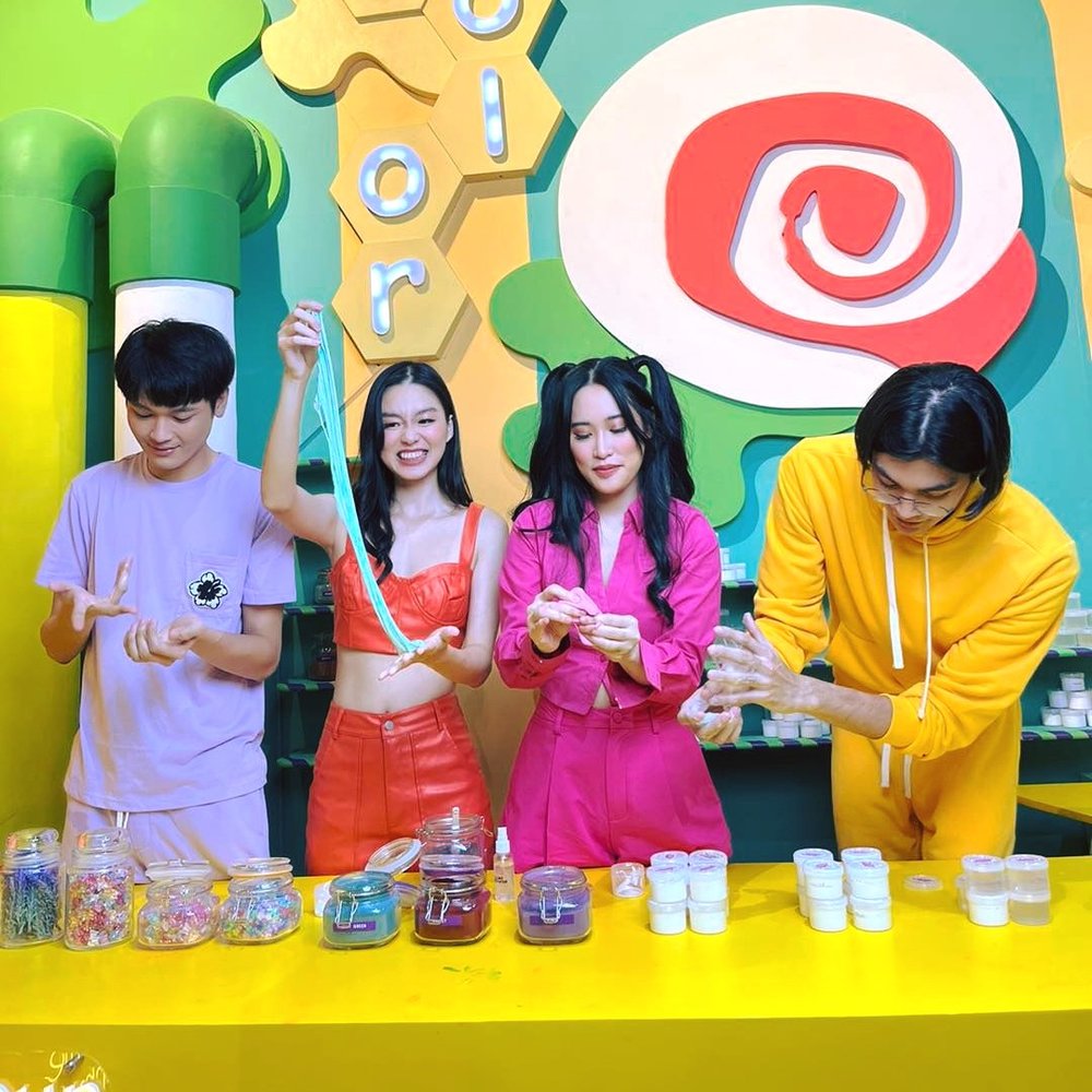 group of friends playing slime